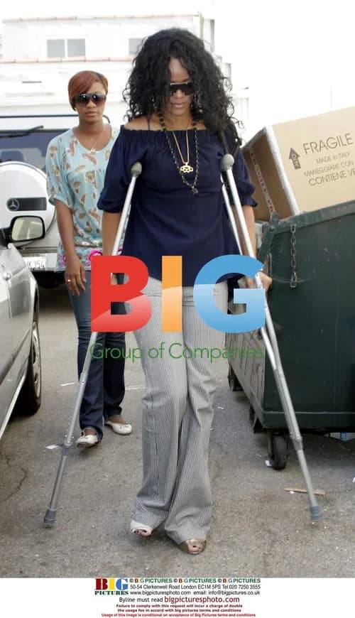 Rihanna Leaves Hair Salon on Crutches