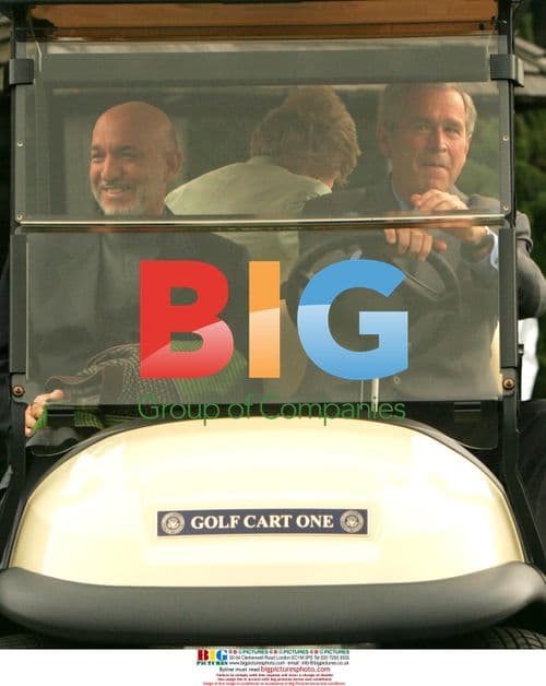 Bush Gives Karzai Ride at Camp David