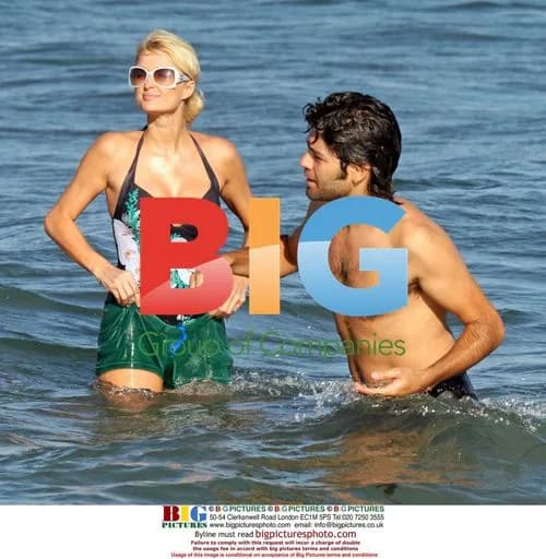 Paris Hilton flirts with Adrien Grenier