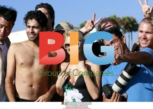 Paris Hilton and Adrian Grenier frolic at Malibu beach