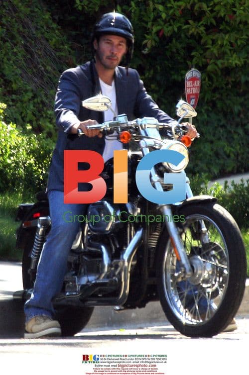 Keanu Reeves Leaves Home with Blonde