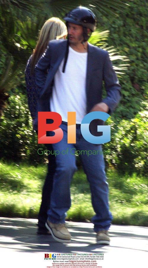 Keanu Reeves with mystery blonde