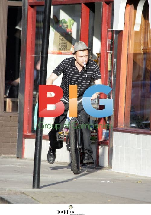 Damon Albarn Rides Bicycle in London