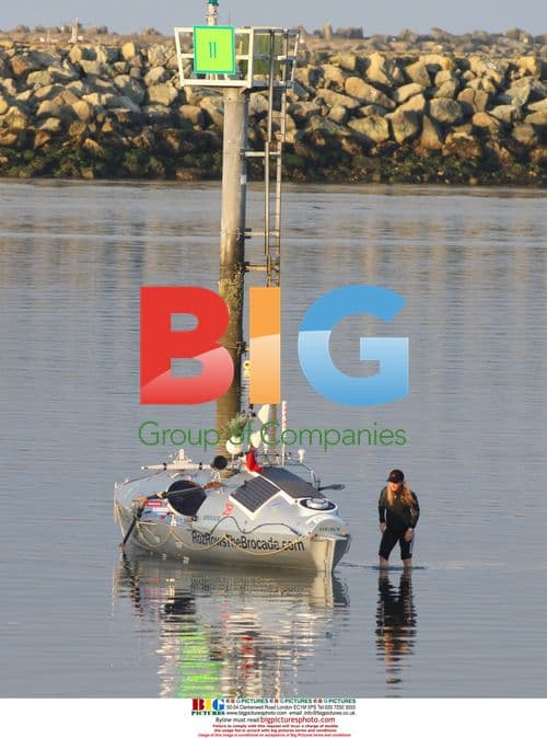 Roz Savage Checks Rowboat After Grounding