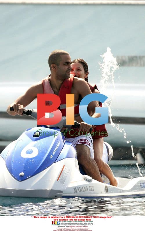 Eva Longoria in Gold Swimsuit with Tony Parker