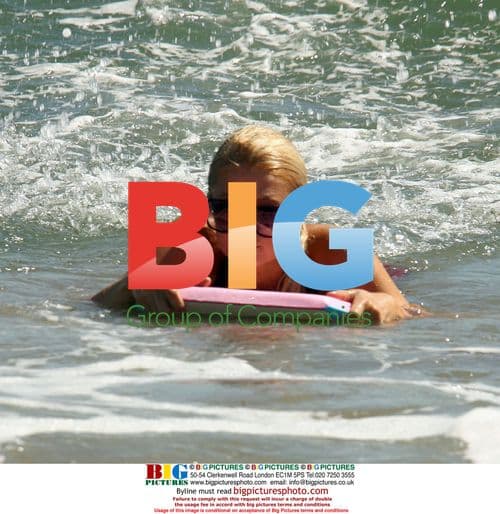 Paris Hilton Boogie Boarding in Malibu