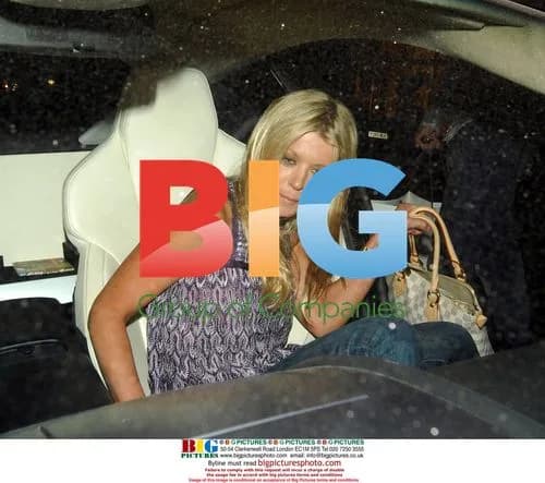 Tara Reid Arriving at Hotel