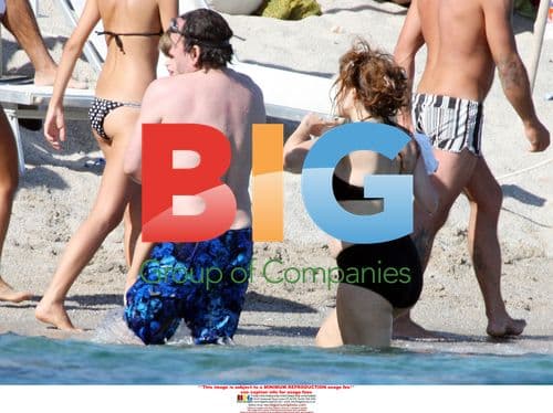 Helena Bonham-Carter and Tim Burton Enjoy Family Swim in Italy