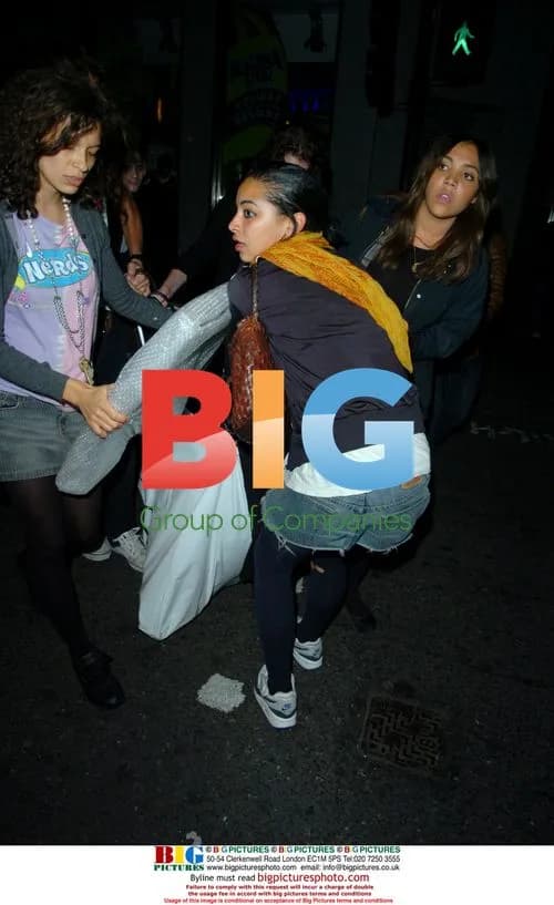 Lily Allen hides in bag leaving Punk Club