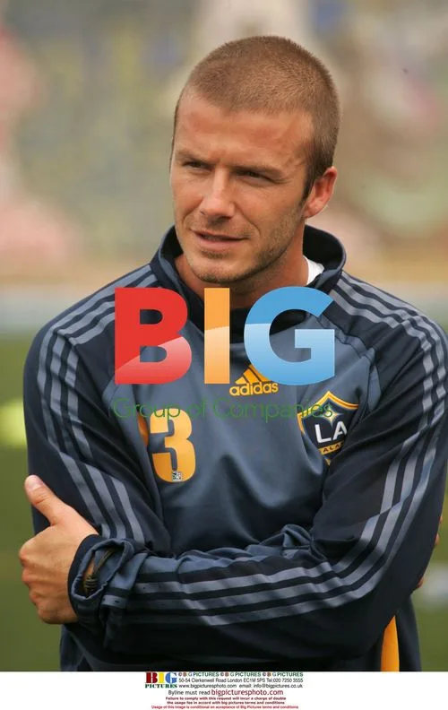David Beckham Holds Soccer Clinic in Harlem