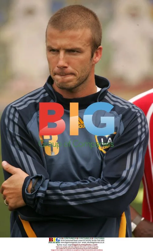 David Beckham Holds Soccer Clinic in Harlem