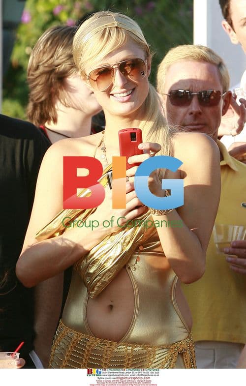 Paris Hilton Enjoys Party at Malibu Beach House