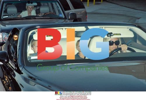 Victoria Beckham Leaves LA Office with Sons