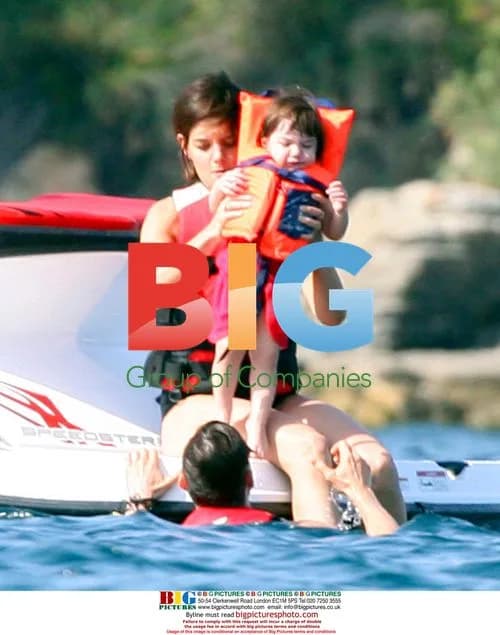 Tom Cruise, Katie Holmes and daughter Suri jet skiing