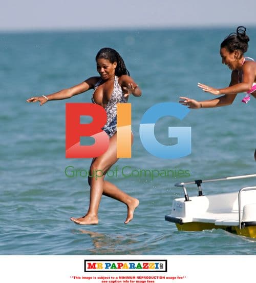 Charley Uchea and Sister Slide into Sea