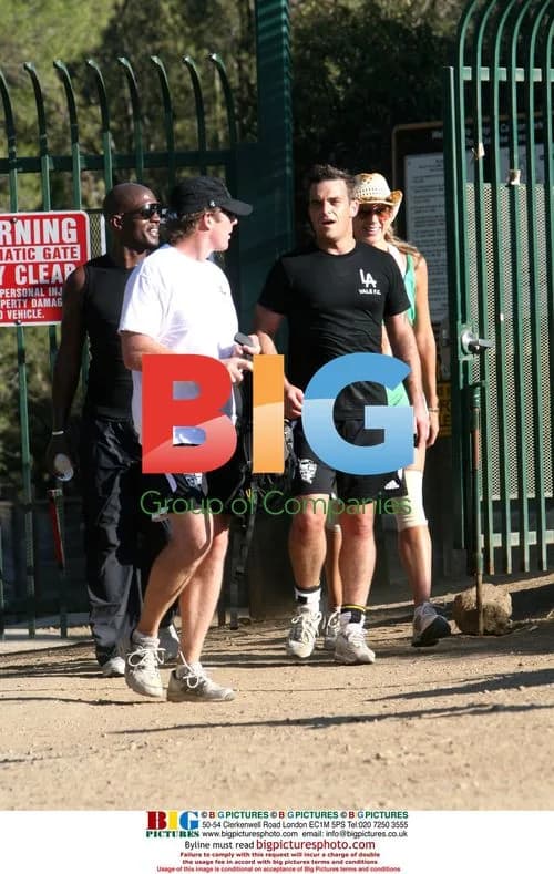 Robbie Williams trains with personal trainer in LA