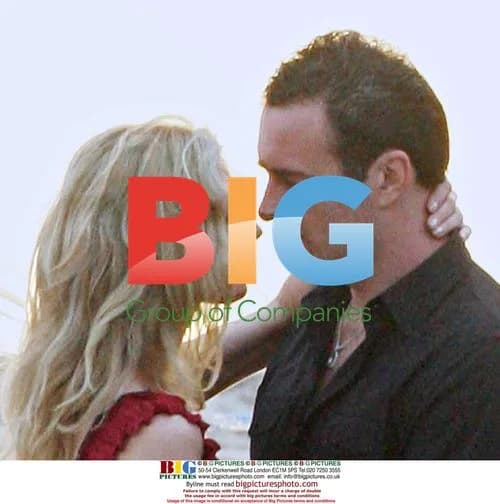 Julian McMahon and Joely Richardson film romantic beach scene