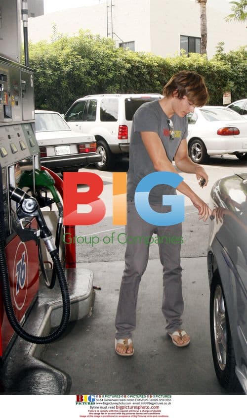 Zac Efron Fills Up at Pricey Gas Station