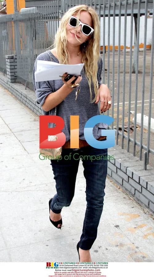 Mary-Kate Olsen Flashes Million Dollar Smile