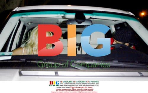 Pamela Anderson and Rick Solomon Leaving Madeos