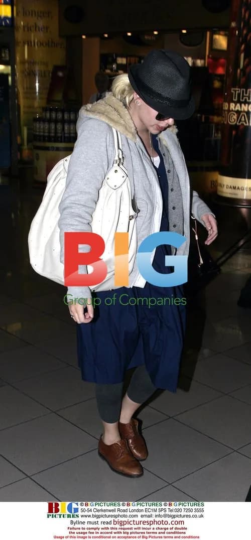 Scarlett Johansson departs Heathrow