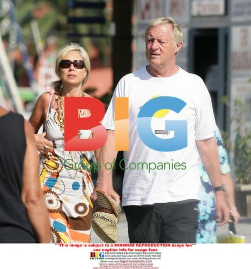 Chris Tarrant gets cozy with girlfriend in Italy