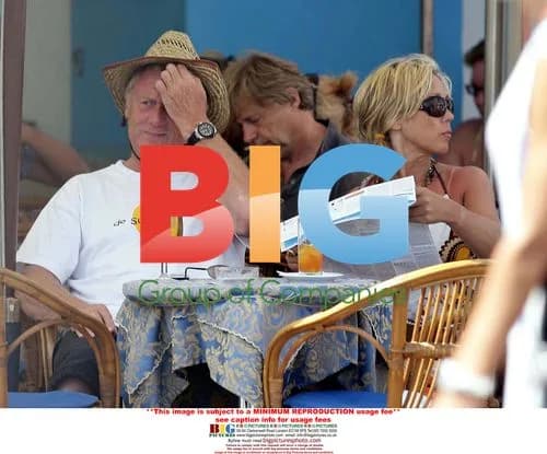 Chris Tarrant and Jane Bird cozy in Italy