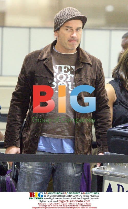 Julian McMahon Departs LAX with Family