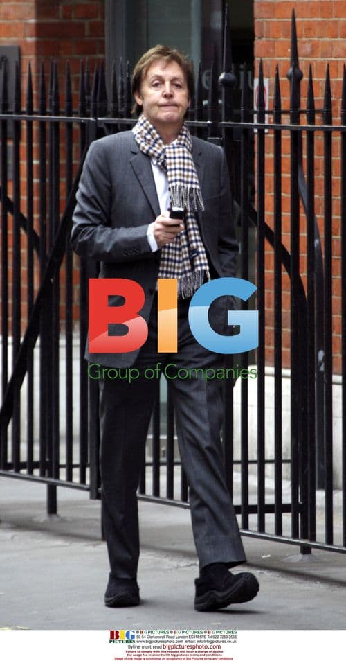 Paul McCartney strolling in Soho