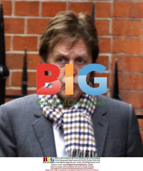 Paul McCartney takes Soho morning stroll