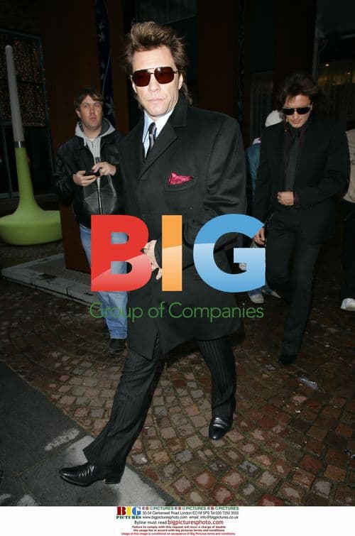 Jon Bon Jovi and Richie Sambora leave Radisson Hotel