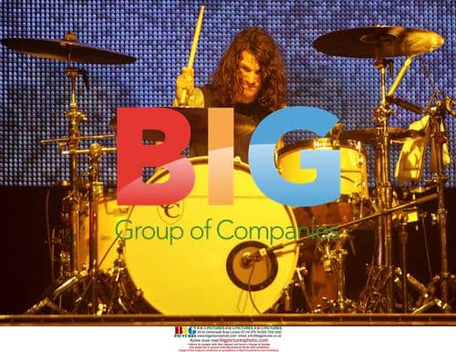 Andy Hurley of Fall Out Boy performs