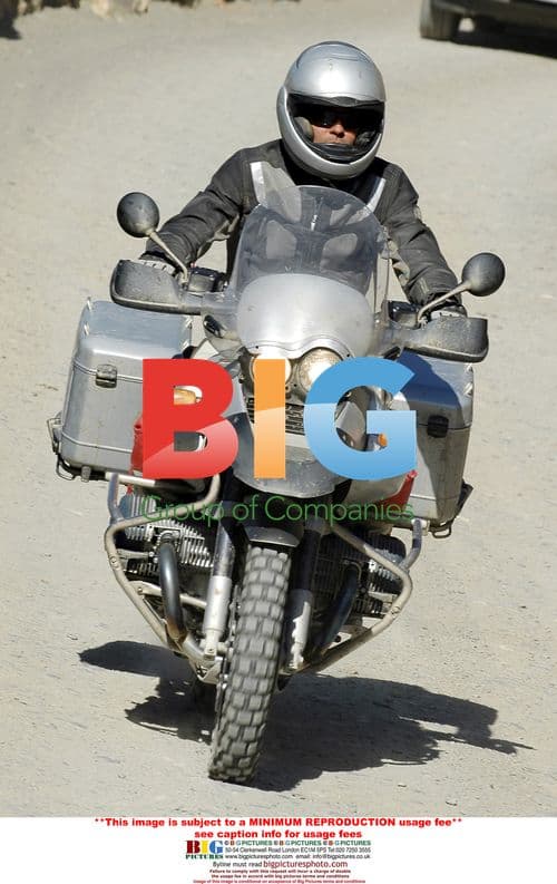 Brad Pitt tries out BMW motorcycle