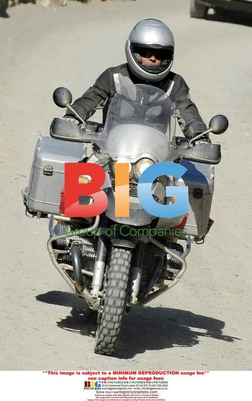 Brad Pitt tries out BMW motorcycle