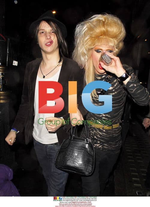 Transvestite DJ Jodie Harsh Drinking Vodka