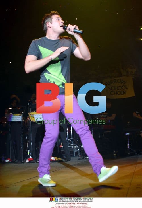 Lee Ryan performs with Young Voices school choir