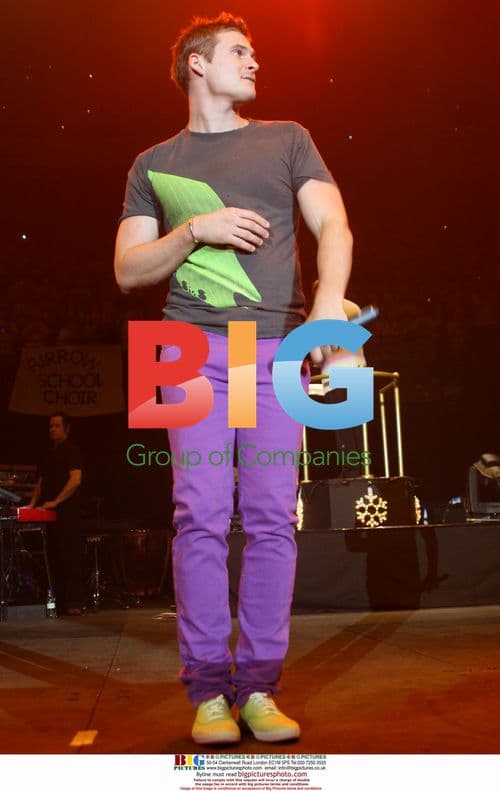 Lee Ryan performs with Young Voices school choir