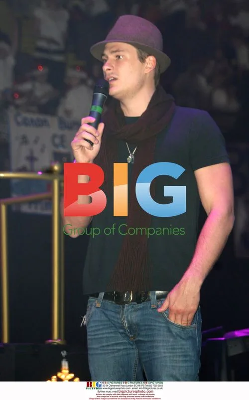 Lee Ryan performs with Young Voices school choir