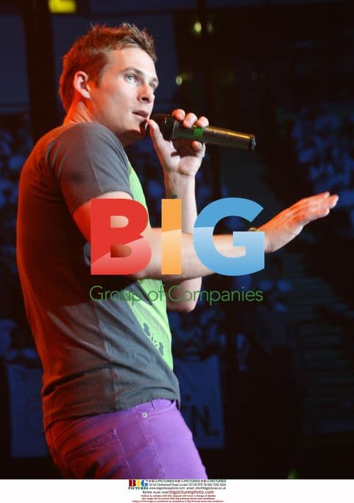 Lee Ryan (ex Blue) performs with Young Voices school choir