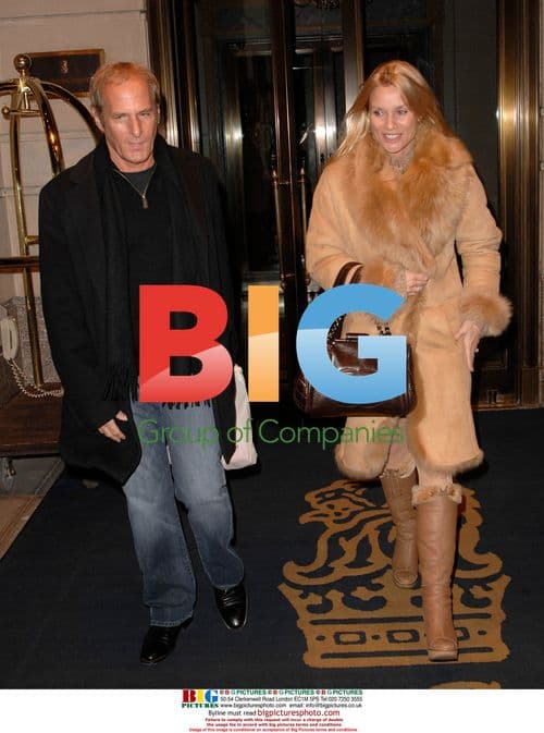 Nicolette Sheridan and Michael Bolton Exit Hotel