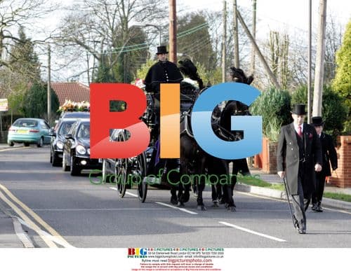 Kelly Brook attends father's funeral