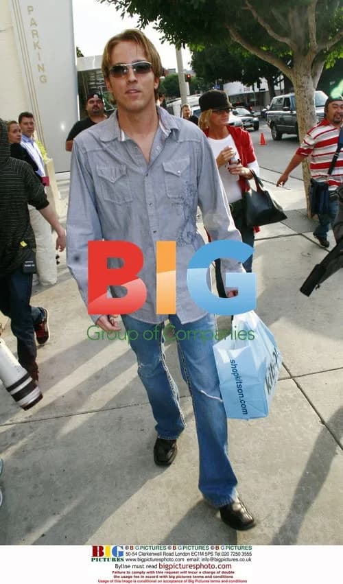 Larry Birkhead Shops at Kitson Boutique