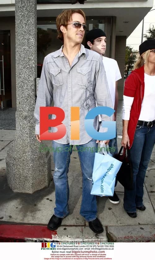 Larry Birkhead shops at Kitson boutique