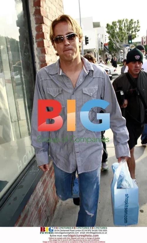 Larry Birkhead shops at Kitson boutique