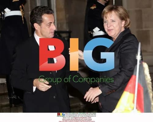 Sarkozy Meets Merkel at Palais de l'Elysee