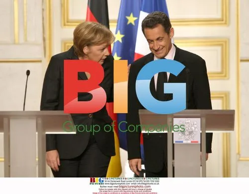 Sarkozy Meets Merkel at Palais de l'Elysee