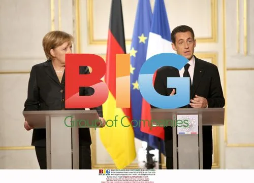 Sarkozy Meets Merkel at Palais de l'Elysee