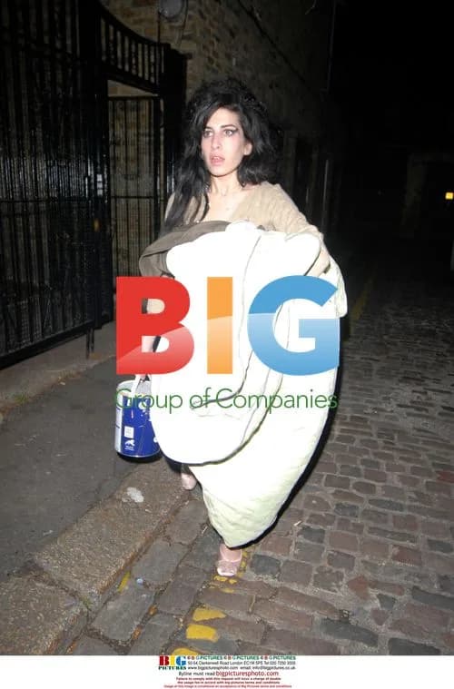 Troubled Amy Winehouse Leaving Home