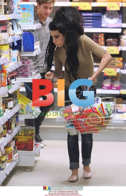 Amy Winehouse Seen Leaving Home With Friend