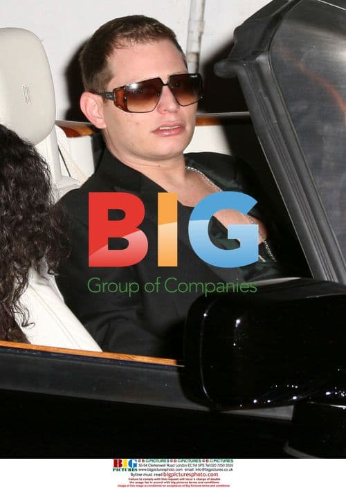 Paris Hilton and Scott Storch Leave Club